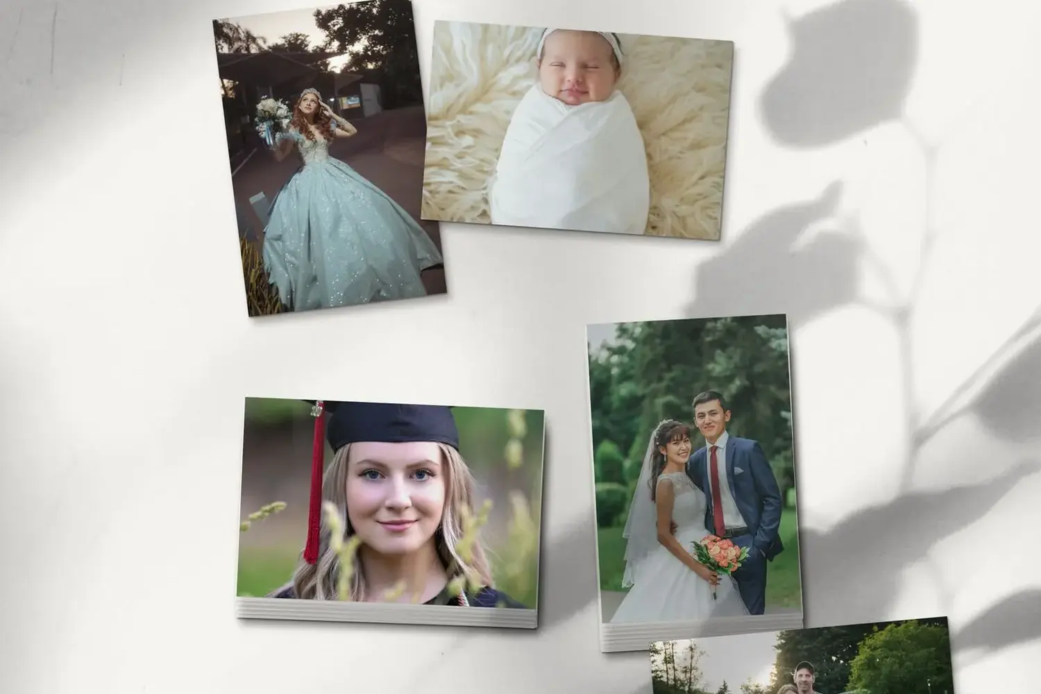 Pilas de fotos impresas de sesiones de XV años, boda, graduación y familia